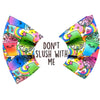 colourful pet bow tie. Rainbow colour slush puppy pattern. Badge in the middle - Don't slush with me