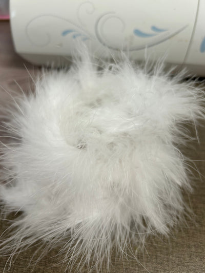 ADD FLUFF TO YOUR BOW