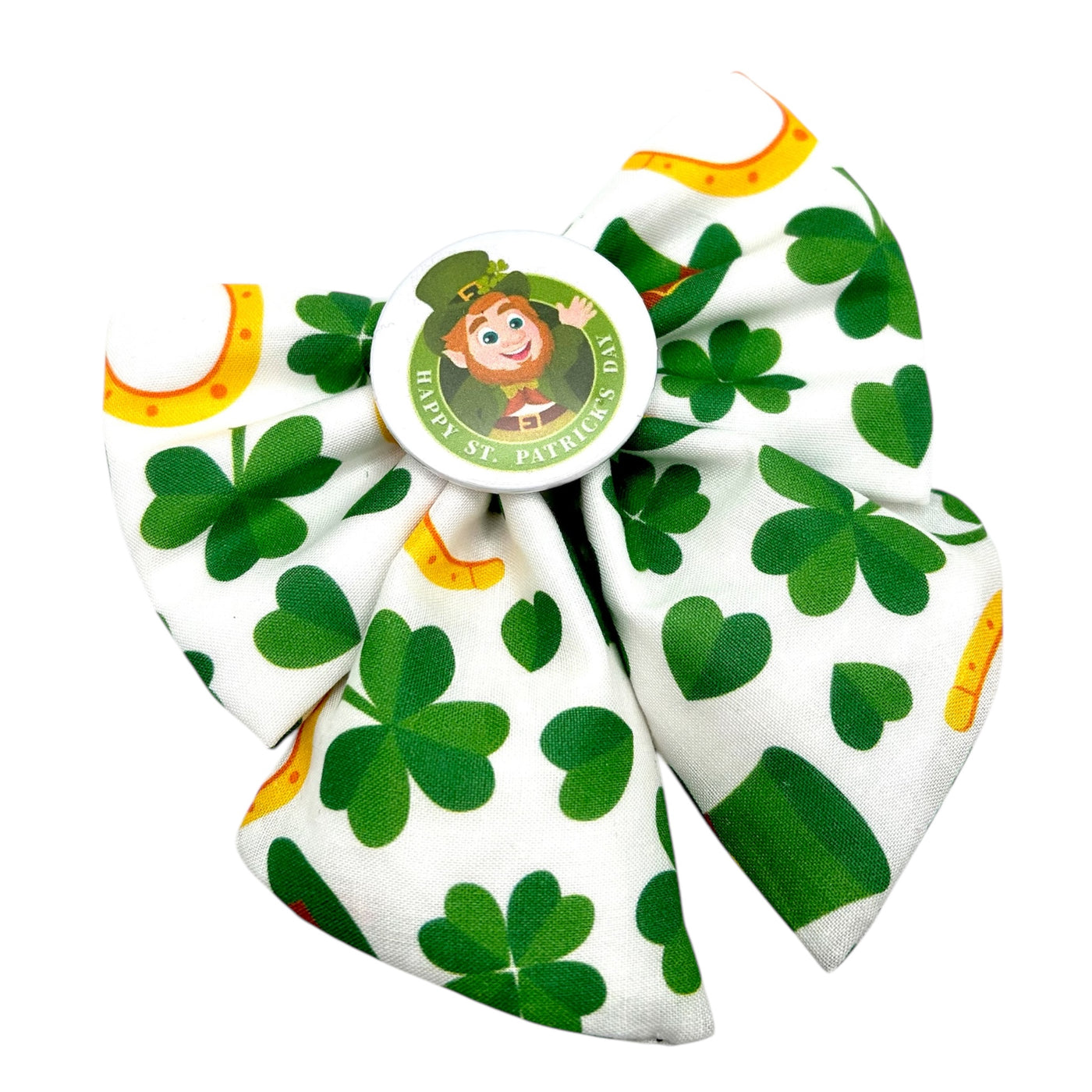 St Patrick's sailor bow for pets. White bow with shamrocks, Irish hats and Gold horse shoe print. Badge in the middle that reads " Happy St Patrick's Day" With a leprechaun in the middle