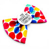 Colorful patterned dog collar bowtie, shown from a closer angle 