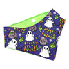 A funny Halloween pet bandana with a  Halloween print, featuring white ghosts, tombstones reading 'RIP All My F*cks', and the phrase 'Spooky Little F*ck' on a purple background, with a bright green interior lining and a white snap closure.