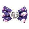 Purple dog bow with lambs, cloud and flower pattern and motivational quote on a white background.