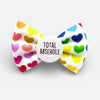 Funny dog bow tie. Rainbow hearts pattern on white background. Rude badge attached to the middle. 