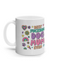 Dog Mum themed mud. 10oz. White mug with colour images all over. Hearts, rainbows, flowers. Lots of colours - Pink, purple, orange, green, yellow. Has in large print "Best Fu*king dog Mum Ever" printed on both sides of the mug