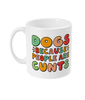Dog themed ceramic mug, with offensive slogan “dogs because people are cunts” in a colourful font, shown on a white background 